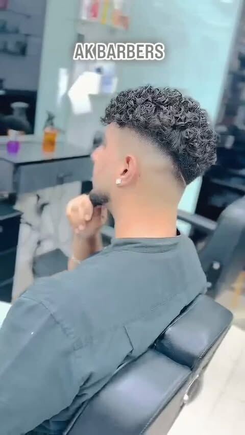 A perm with a skin fade